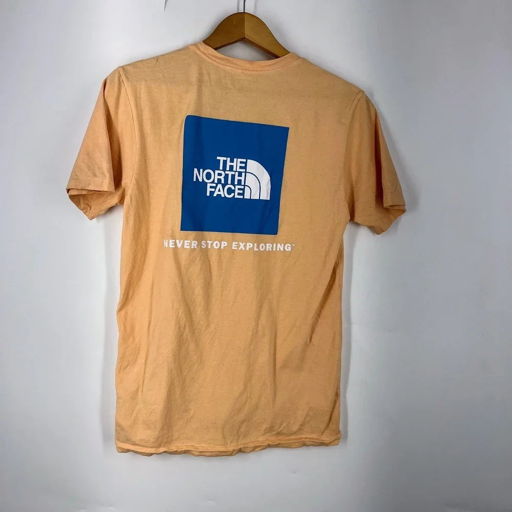 The North Face Mens Peach Graphic Short Sleeve T-Shirt Blue Box Logo Size‎ S